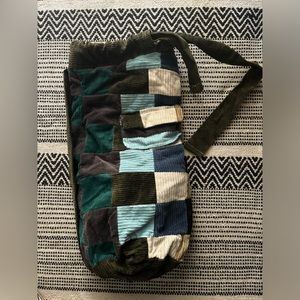 Handmade quilted backpack purchased from local record store